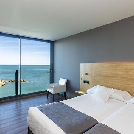 Hotel Astuy Isla Bagian luar foto