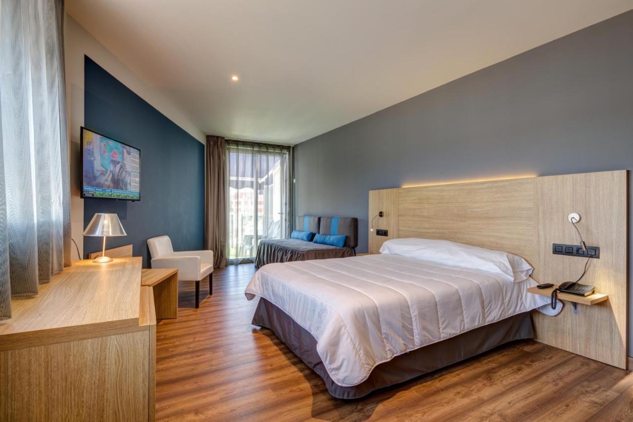 Hotel Astuy Isla Bagian luar foto