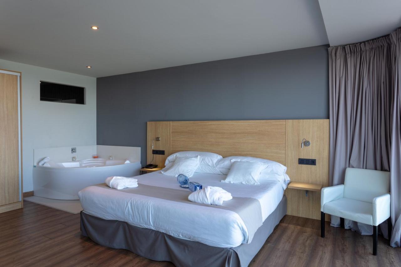 Hotel Astuy Isla Bagian luar foto