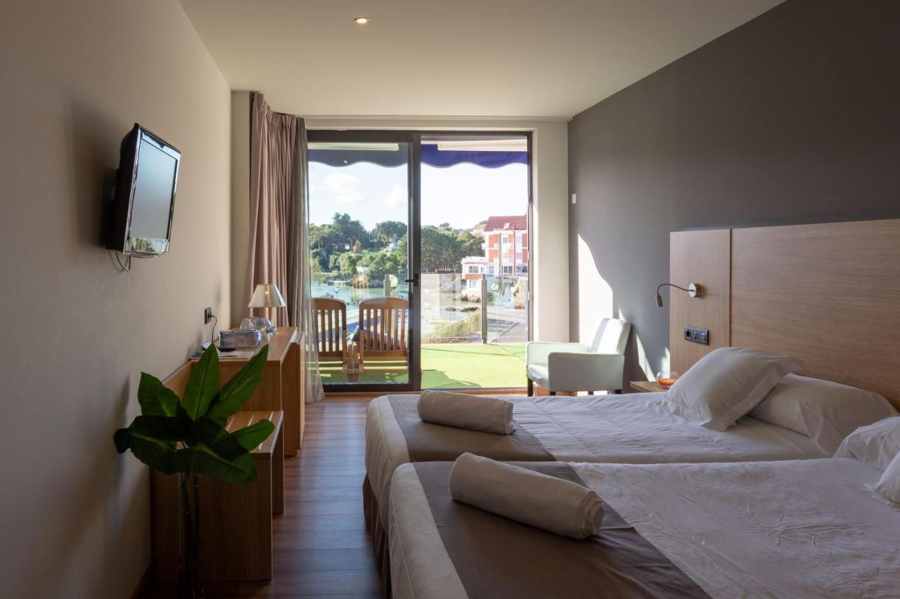 Hotel Astuy Isla Bagian luar foto