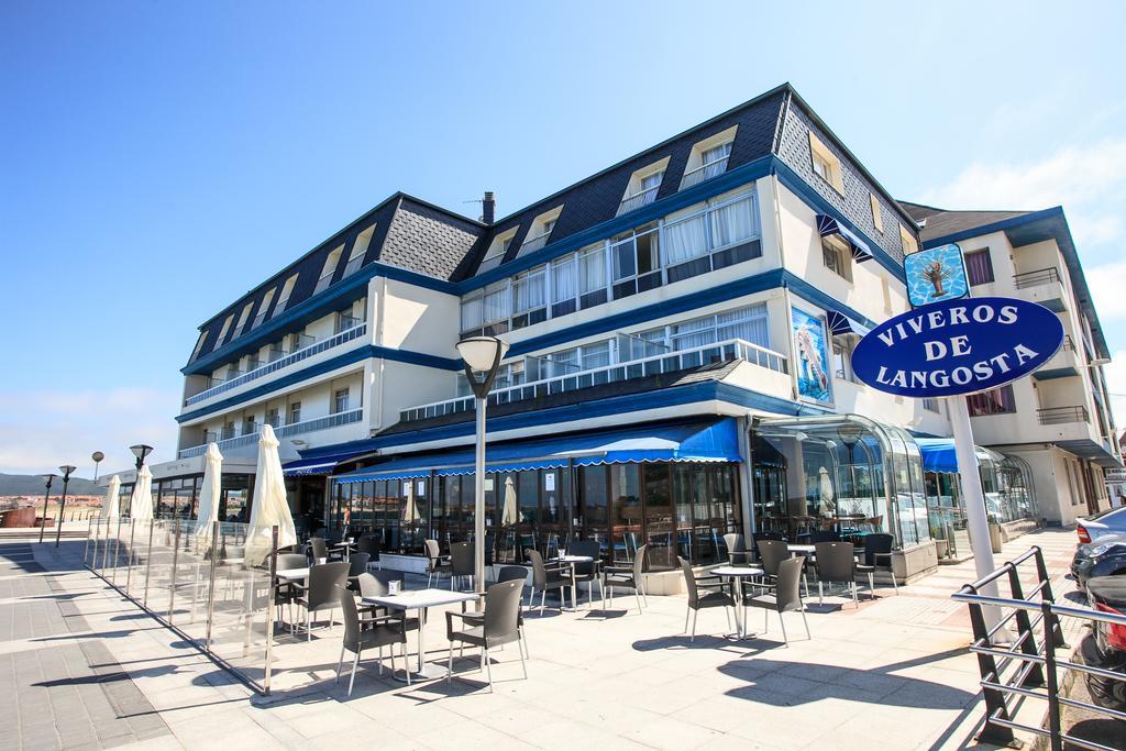 Hotel Astuy Isla Bagian luar foto