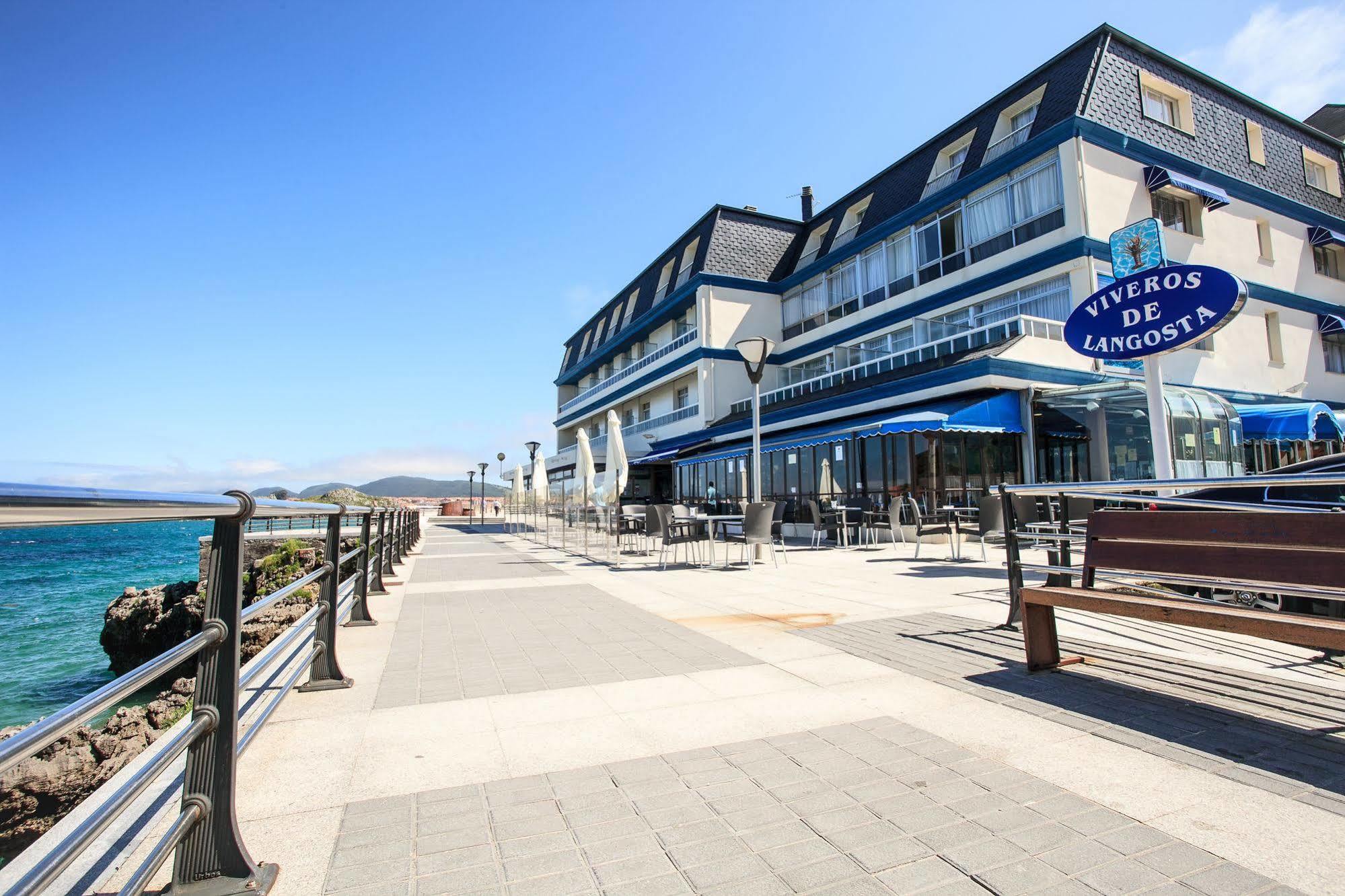 Hotel Astuy Isla Bagian luar foto