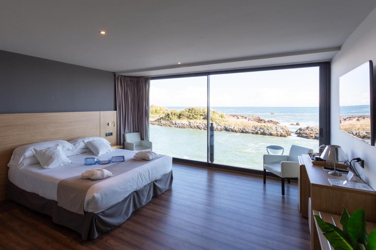 Hotel Astuy Isla Bagian luar foto