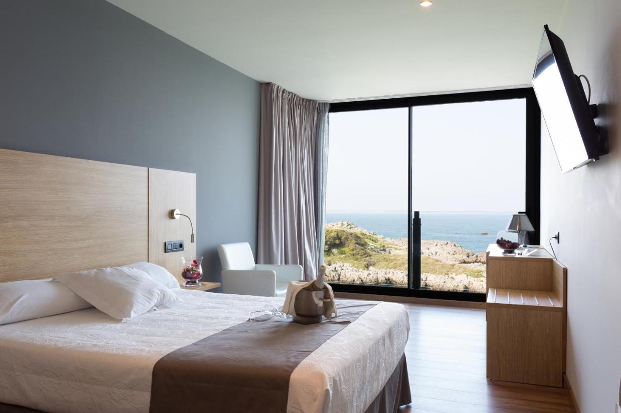 Hotel Astuy Isla Bagian luar foto